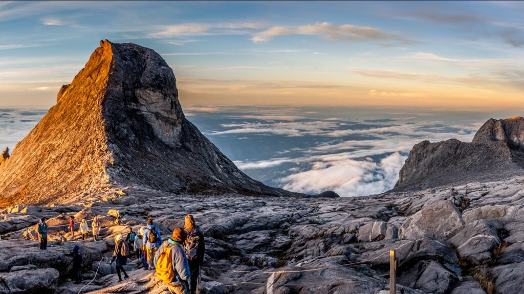 Tourists climbing Sipadan, Sabag