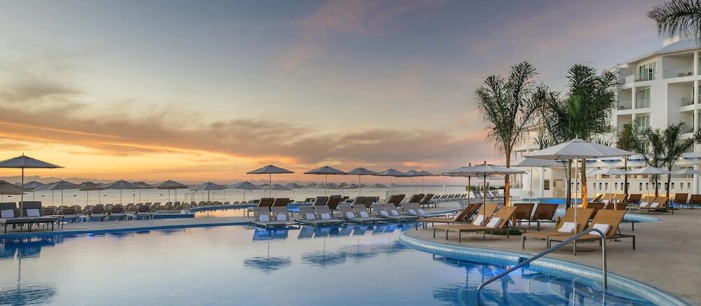 Poolside image of luxury resort in Mexico, Palace Resorts